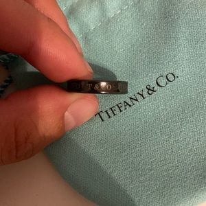 Tiffany & Co Dark titanium ring. Size is 4.5